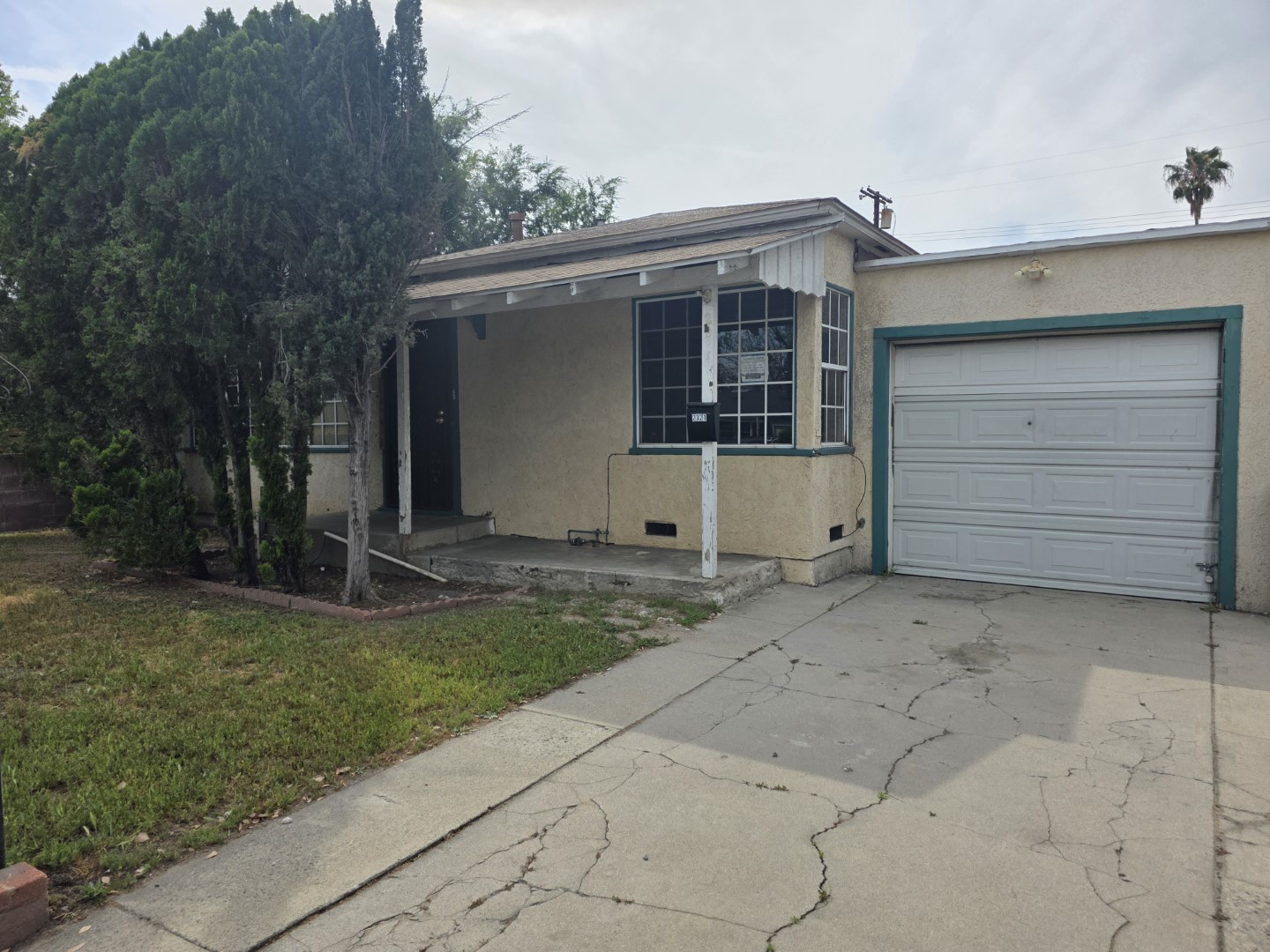 Covered front porch and attached garage