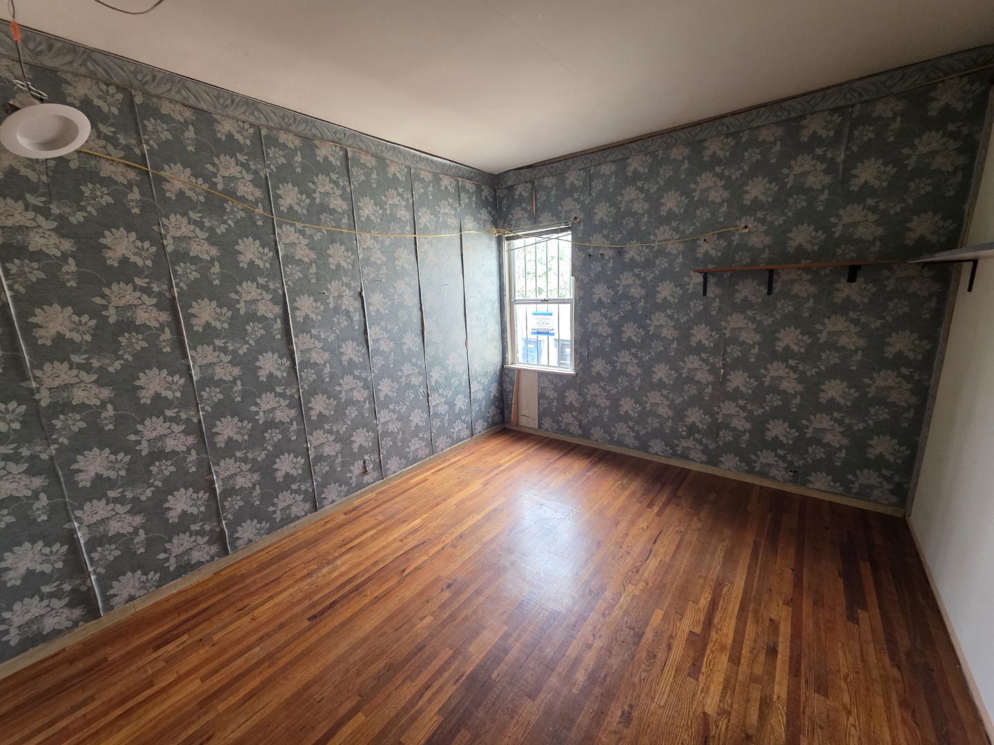 Bedroom with hardwood floors