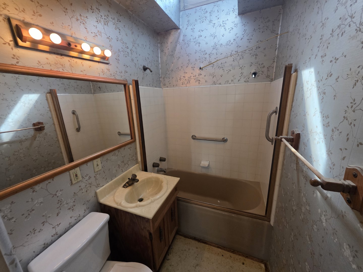 Bathroom with tub and shower