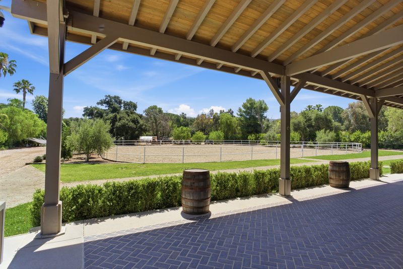 Covered stalls toward the corral