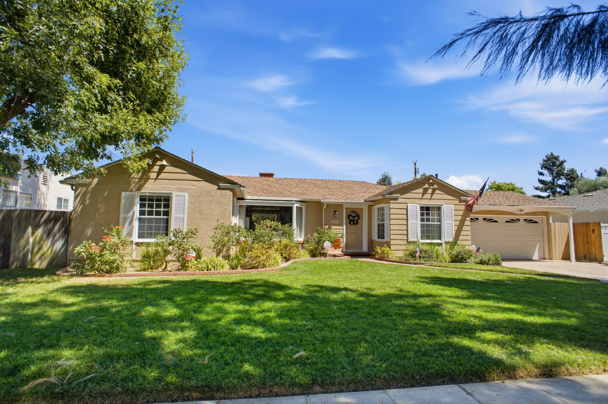 620 S. Sparks Street, a single level ranch home behind a deep front lawn